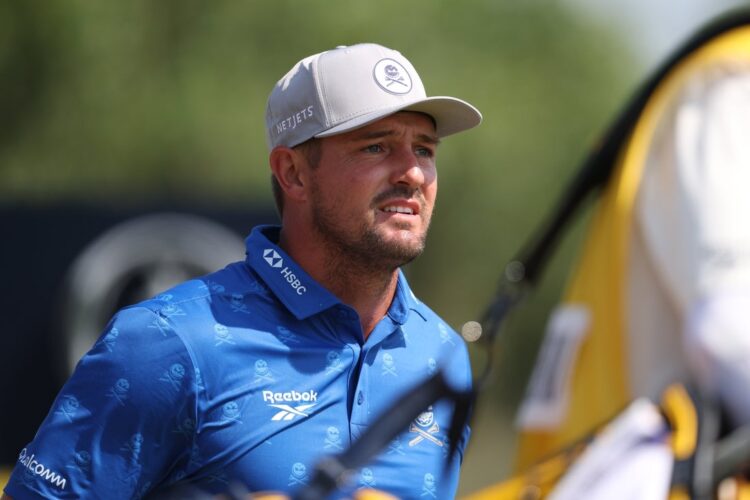 Брайсон Дешамбо получил два штрафных удара на The Open за улучшение позиции мяча